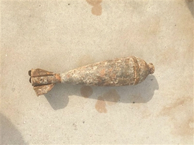 驚！江蘇鎮江某采石場的傳送帶上發現一枚炮彈