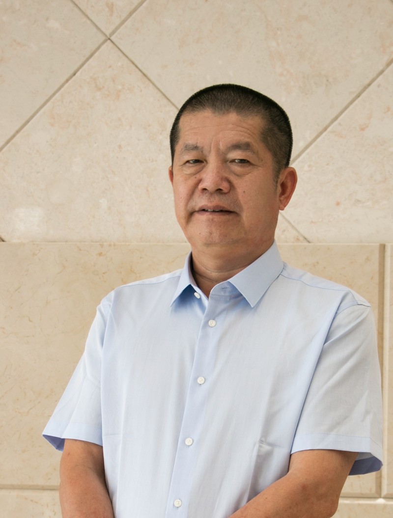 光明石材董事長黃明經