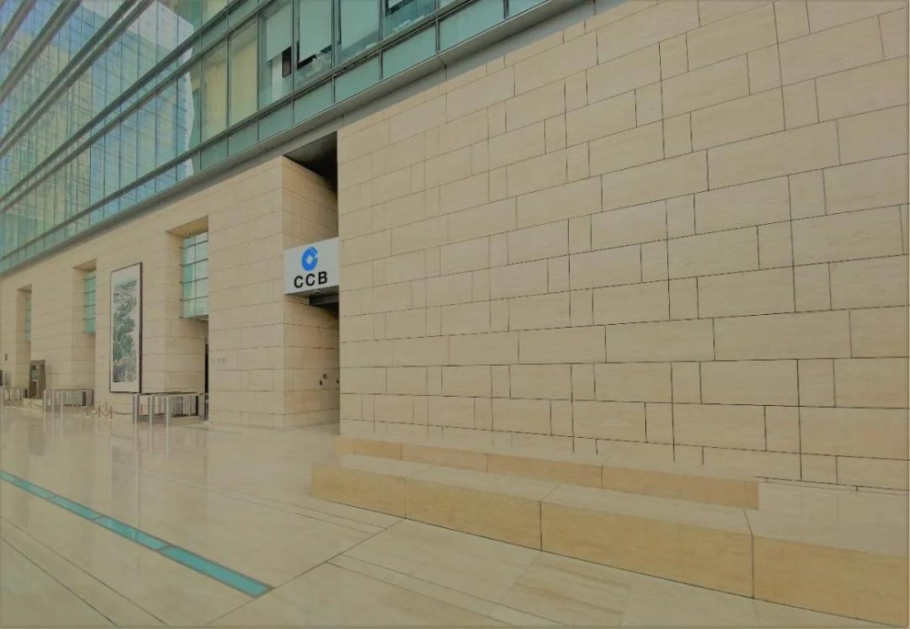 新保利大廈大堂用意大利進(jìn)口洞石裝飾墻面應(yīng)用